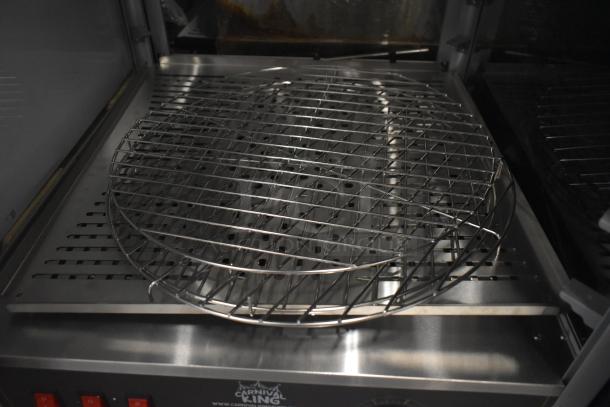 Brand new Carnival King 382HPWR18D2 18" pizza warmer/merchandiser. Visible wire racks, control panel with switches.
