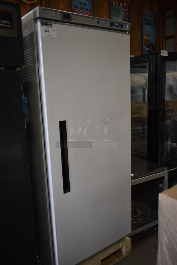 BRAND NEW Arctic Air AWR25 White Refrigerated Single Door 25 cu. ft., 120V, 1 Phase, slight scratches, model label visible.