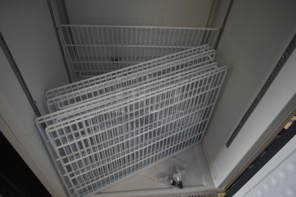 Arctic Air AWR25Z reach-in refrigerator, 25 cu. ft., scratch and dent, includes shelving and hardware, 120V, 1 phase.