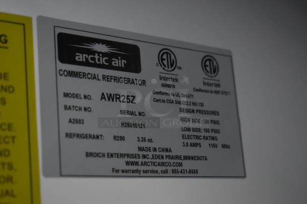 Arctic Air AWR25Z label, detailing model, refrigerant type R290, and 115V electric rating. Made in China.
