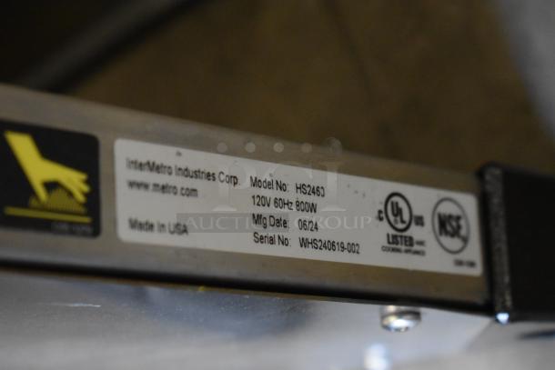 BRAND NEW SCRATCH AND DENT! Metro Super Erecta Hot HS2460 24x60 stainless steel heated shelf. Label shows model, voltage, and certifications.