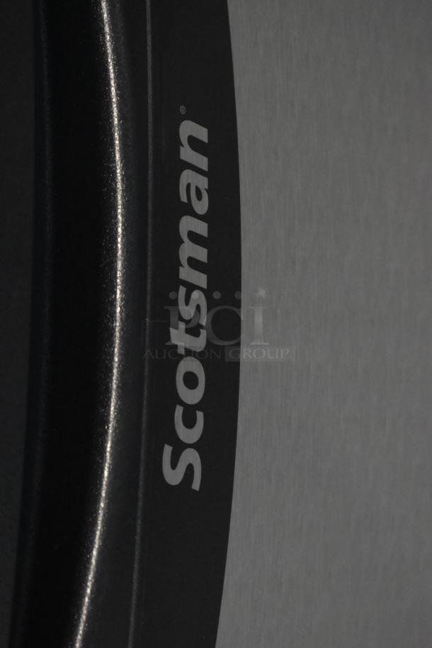 2023 Scotsman CU0415MA-1A ice machine, brand new condition, scratch and dent. Logo visible, 58lb capacity, 115V, 1 phase.