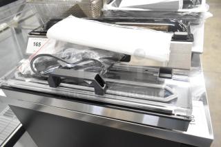 BRAND NEW SCRATCH AND DENT! Galaxy GVME16SS Vacuum Packaging Machine with 16" Seal Bar, Roll Cutter and Dual Piston Pump - 120 Volts, 1 Phase.