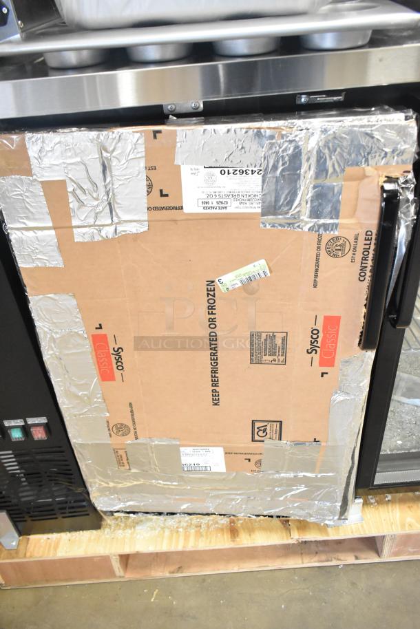 "2025 Avantco 178UBB72GHC 73-inch back bar refrigerator, black, glass door covered due to damage, LED lighting, 120V."