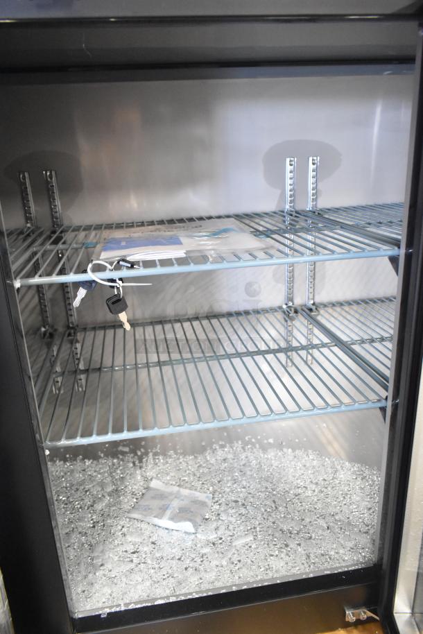 Avantco 178UBB72GHC black back bar refrigerator, 73", glass doors, LED, scratch and dent, broken glass visible. 120V, 1 phase.