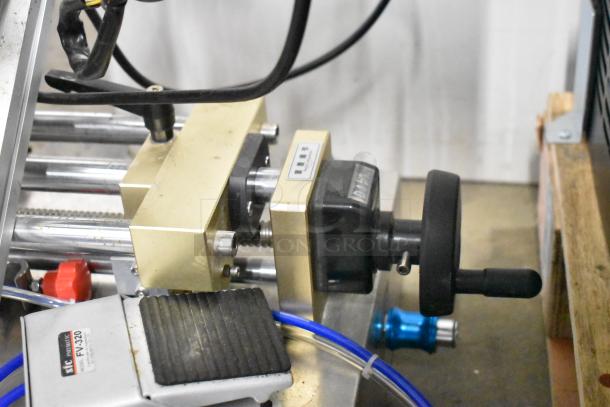 Countertop meat mixer with SIC FV-320 pneumatic food pedal, featuring metal and plastic components, in used condition.