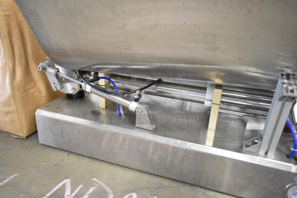 Countertop meat mixer with SIC FV-320 pneumatic food pedal, stainless steel, visible connectors, in good condition.