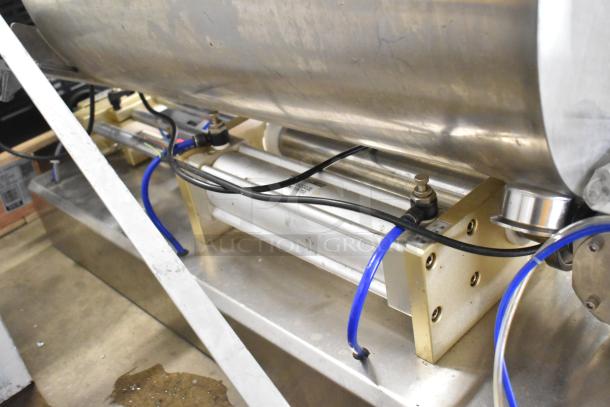 Countertop meat mixer with SIC FV-320 pneumatic food pedal, stainless steel, durable condition, visible wiring and connectors.