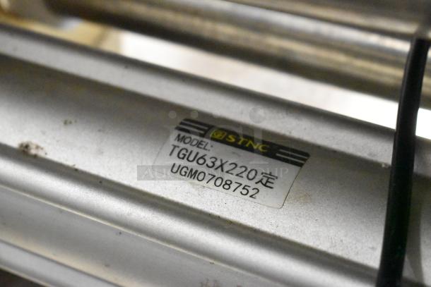 Countertop meat mixer with SIC FV-320 pneumatic food pedal, shown with STNC model TGU63X220 label.