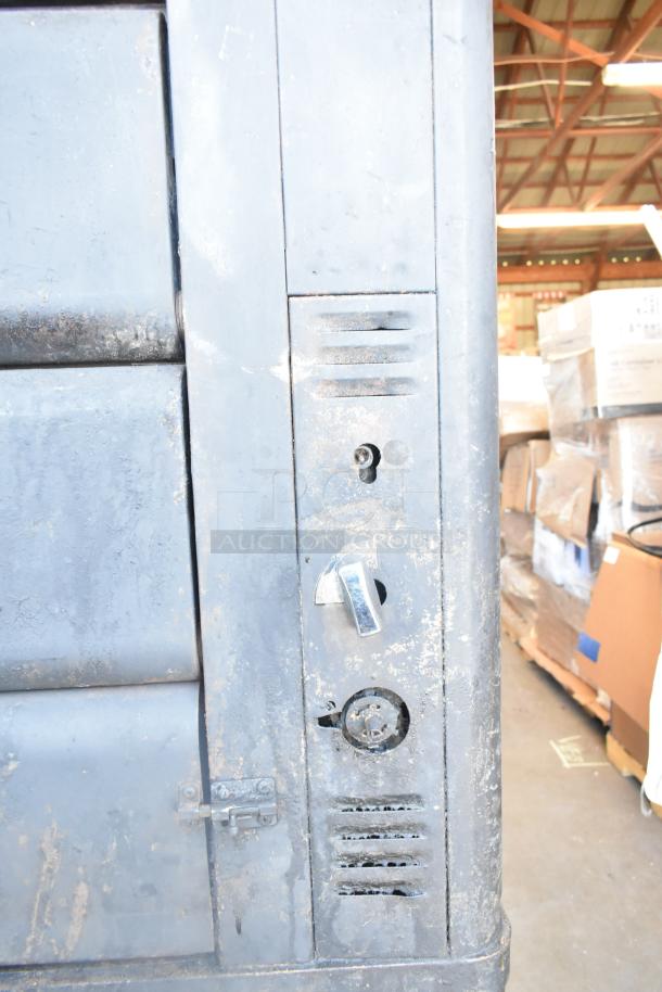 Blodgett 981 commercial natural gas 2-deck pizza oven, 50,000 BTU, visible wear, sturdy construction, vent and control details.