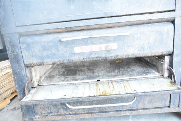 Blodgett 981 commercial two-deck pizza oven, natural gas, 50,000 BTU, visible wear, Blodgett logo on front.