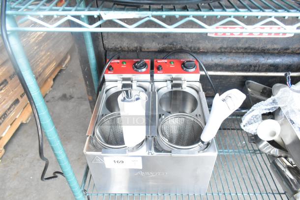 Brand new Avantco 177PC102 electric pasta cooker, 2-gallon capacity, dual sections, visible minor scratches, 120 volts.