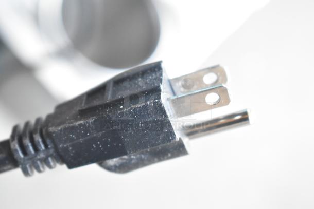 Close-up of a power plug from an Avantco 177PC102 2 Gallon Electric Countertop Pasta Cooker, 120 Volts.