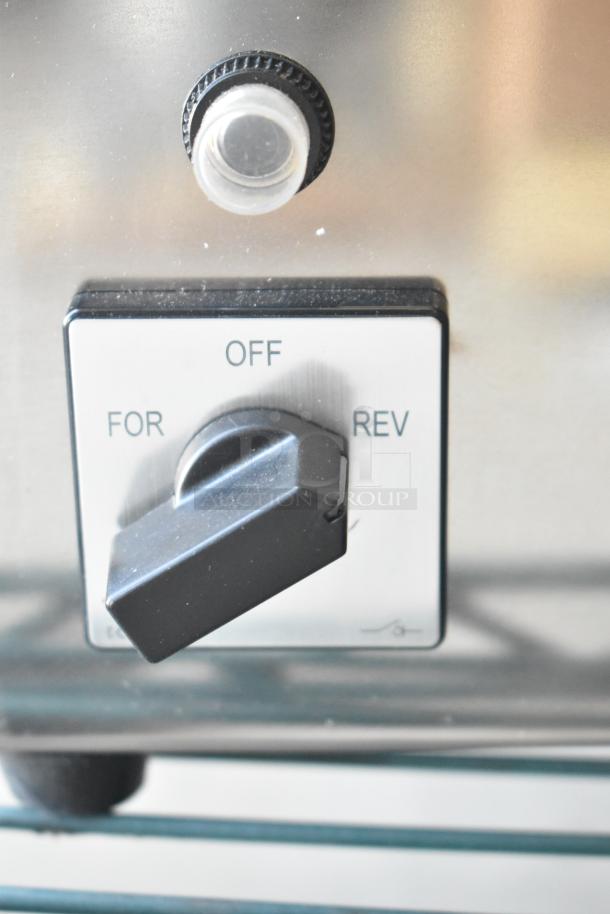 2024 Avantco 177MG22R meat grinder control knob with "OFF," "FOR," "REV" options. Black plastic and metallic finish.