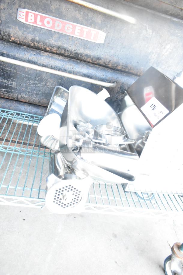 Brand new Avantco 177MG22R Meat Grinder with reverse function, minor scratches, 110 volts, 1 phase, industrial use.