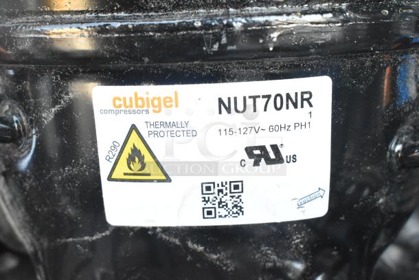 "Brand new Cubigel NUT70NR compressor. Thermally protected, 115-127V, 60Hz, R290 refrigerant. Scratch and dent condition."