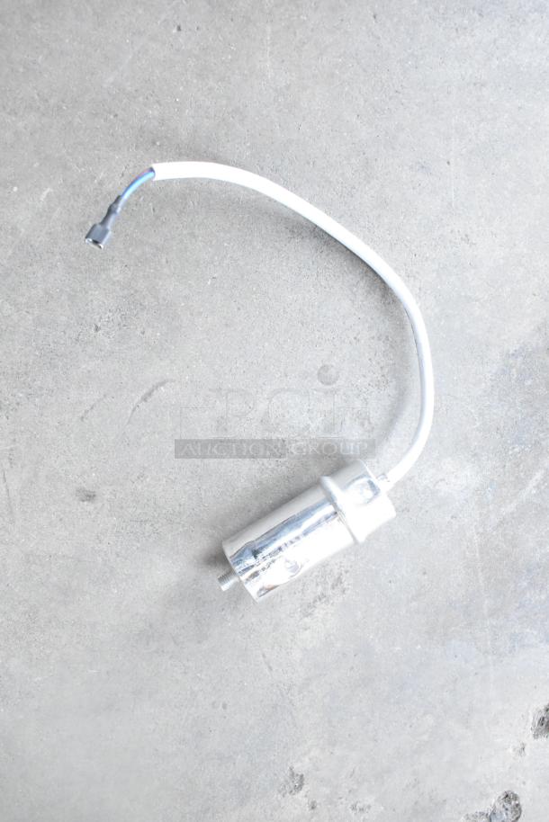 Brand new Cubigel NUT70NR compressor, for Avantco models, scratch and dent condition, visible wiring and connector.