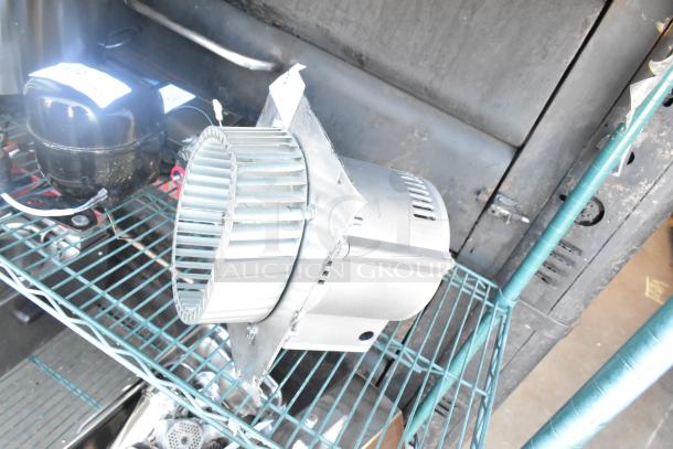 BRAND NEW American Range A37652 Blower Motor Assembly, 1/4 HP, displayed on a shelf, minor cosmetic scratches visible.