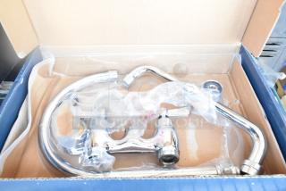 Brand new Waterloo 750FD48G deck mount faucet with 8" gooseneck spout, 4" centers in box, minor scratches.