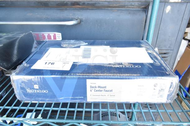 Brand new Waterloo 750FD48G faucet box, showing 8" gooseneck spout, 4" centers, and packaging with minor dents.