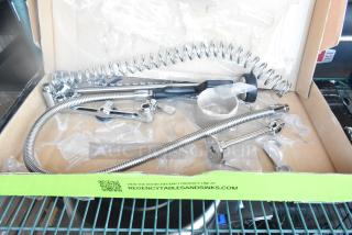 Brand new Regency 600PRW8X scratch and dent wall-mounted pre-rinse faucet with 1.15 GPM, 8" centers, 44" hose in box.
