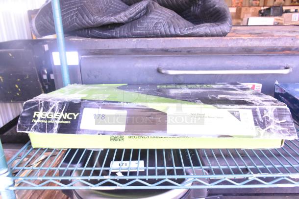 BRAND NEW Regency 600PRW8X 1.15 GPM wall-mounted pre-rinse faucet, 8" centers, 44" hose, in original packaging with slight box damage.