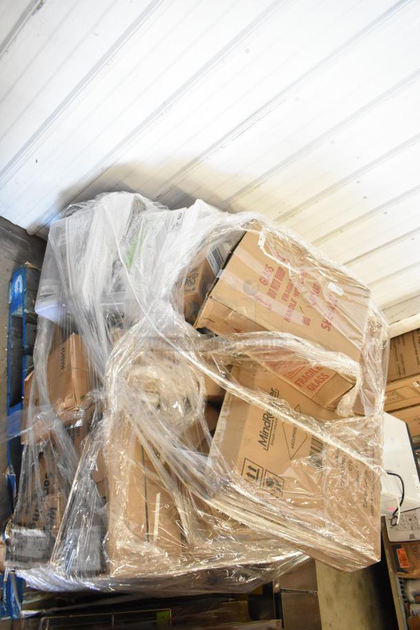 Pallet of 45 scratch and dent items with GoJo Foam Handwash, Scott 91592 Dispenser, Zesta Crackers in wrapped boxes.