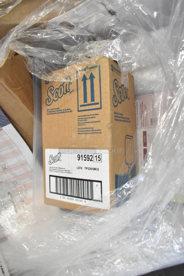 Box labeled "Scott 91592" under plastic wrap, part of a 45 item scratch and dent auction lot.