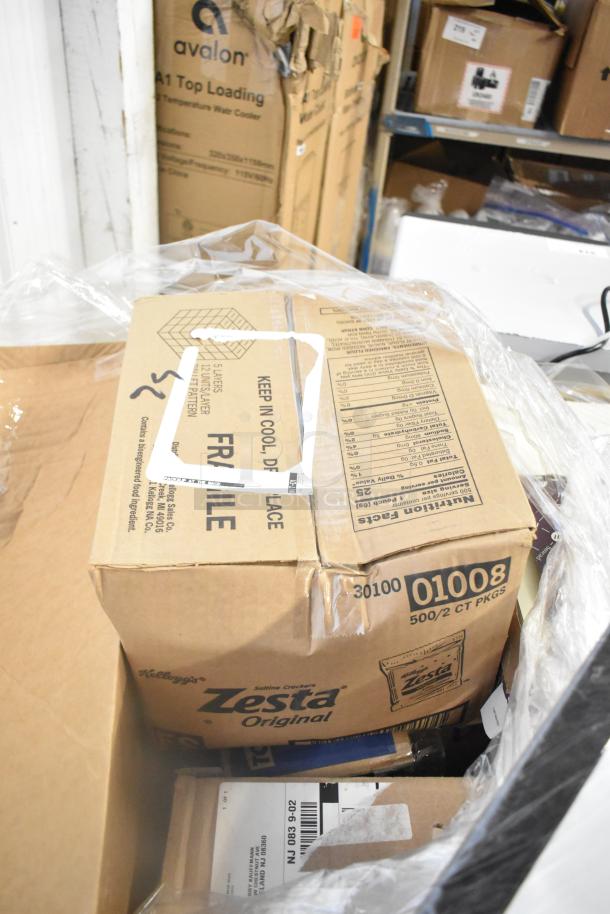 Auction lot of 45 items: GoJo Foam Handwash, Scott 91592 Dispenser, Zesta Crackers. New with minor damage. Boxes labeled fragile.