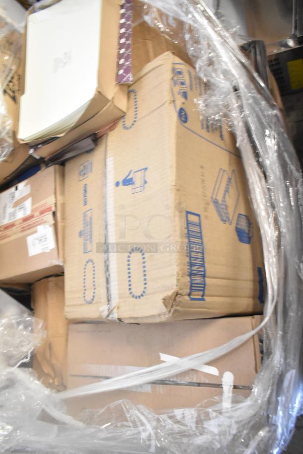 Bulk items in boxes, including GoJo Foam Handwash, Scott 91592 Dispenser, Zesta Crackers. Sold as scratch and dent.