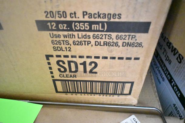 Cardboard box labeled "SD12 Clear" for 20/50 ct. 12 oz packages, compatible with lids 662TS, 662TP, 626TS.