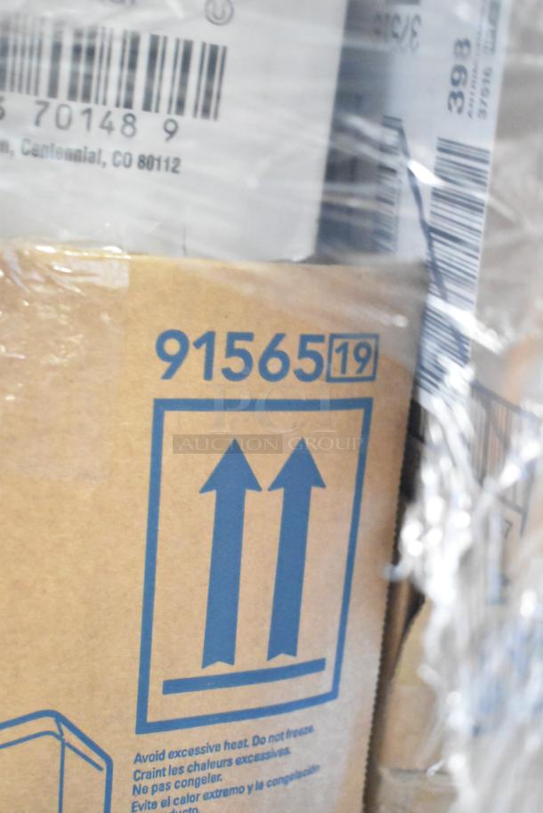 Box with label "91565" and handling instructions. Part of a lot of 30 brand new items, including ketchup and automatic refills.