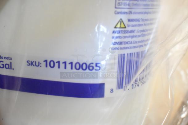 Close-up image of a product label showing SKU: 101110065 and warning text, indicating brand new "scratch and dent" items.