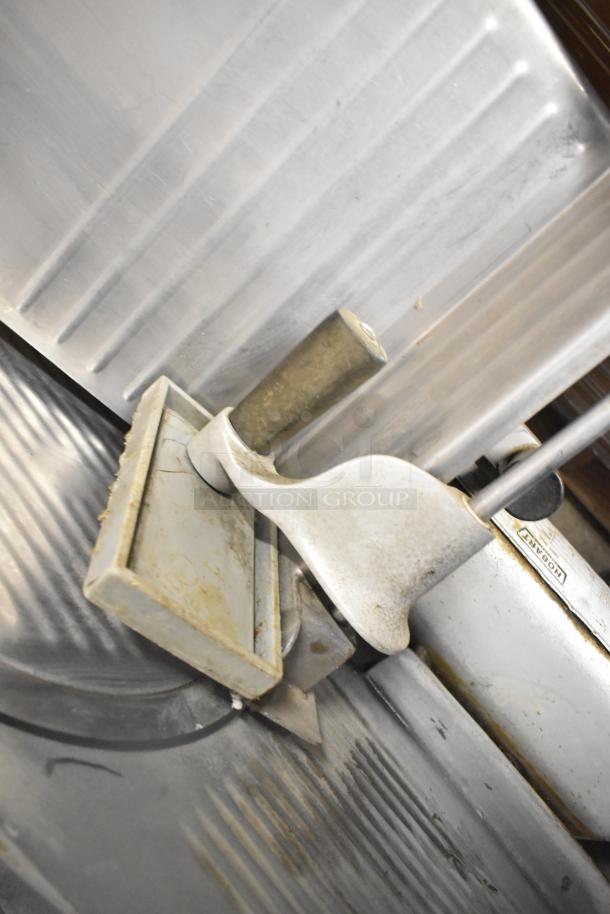 Hobart 1612 Commercial Countertop Meat Slicer in used condition, 115 Volts, 1 Phase, with visible Hobart label.