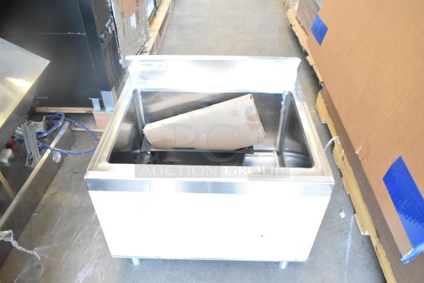 Cooking Performance Group ice bin, model 351GTCPG48NL, new scratch and dent, stainless steel, visible cardboard inside.