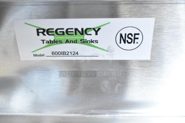 9 new scratch and dent items including sink, ice bin, and sneeze guard. Regency label shows model 600IB2124, NSF certified.
