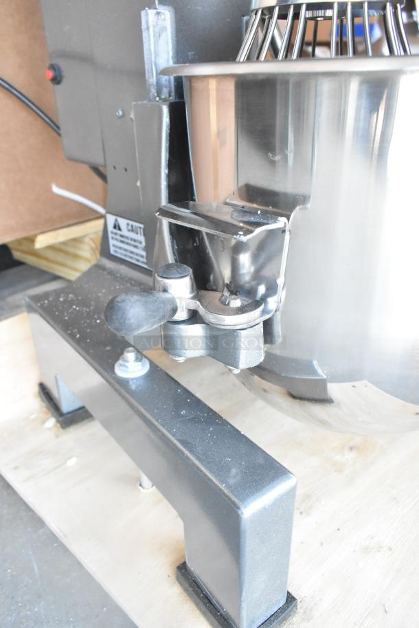 Brand new Avantco MX10H Commercial 10 Qt Planetary Dough Mixer with bowl, guard, whisk, dough hook, and paddle. 120V, 1 Phase.