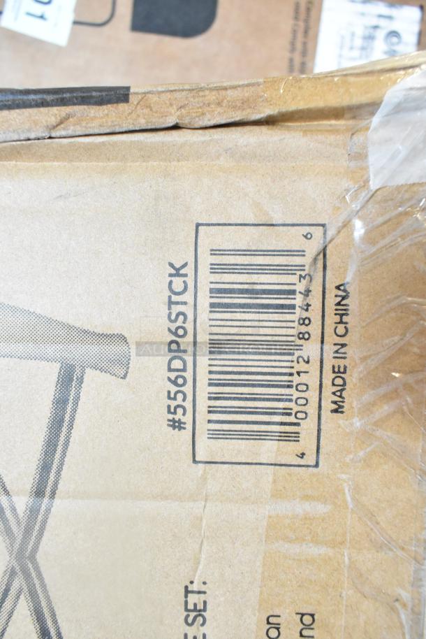 Cardboard box with barcode #556DP6STCK, marked "Made in China." Packaging shows slight wear.
