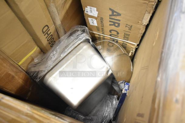 18 new scratch and dent items; visible fry pot, high chair, drum caddy in boxes. Some boxes include product labels.