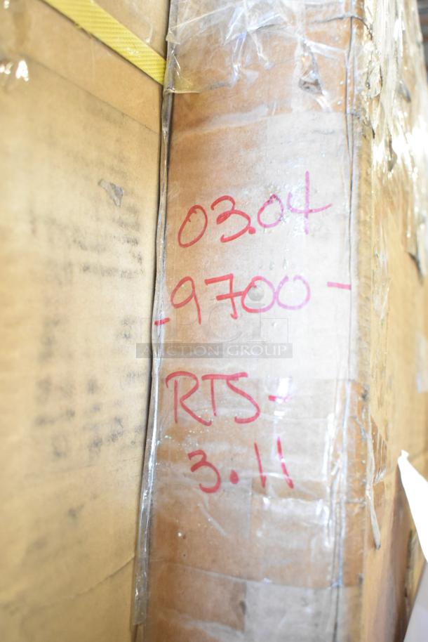 Cardboard box with red markings "03.04", "9700", "RTS", "3.11". Contains 18 new scratch and dent items.