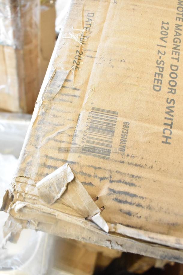 Torn cardboard box labeled "Made in China" with visible damage; barcode and text showing "120V / 2-SPEED" printed on it.