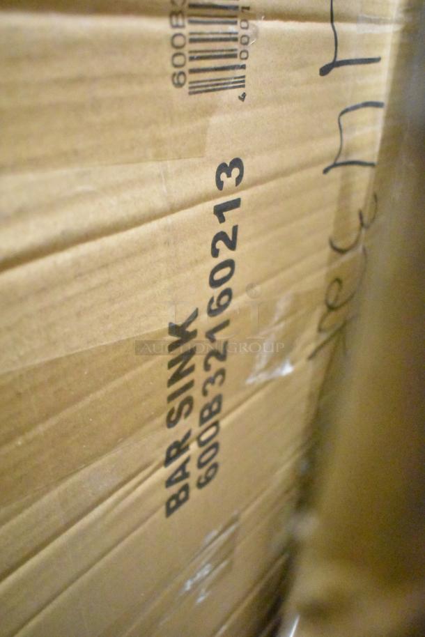 Cardboard box labeled "BAR SINK 600B32160213" with visible barcode. Box is in new but scratch and dent condition.