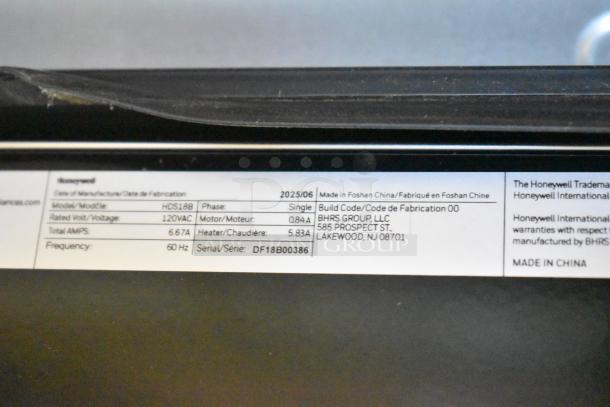 Label of Honeywell HDS18B 18" Dishwasher showing specifications: 120V AC, 6.67A, single phase, serial DF18B00386. Made in China.