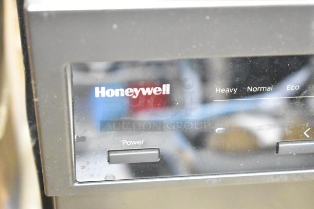 Honeywell HDS18B 18" Dishwasher, 120V, 1 Phase, with modes for Heavy, Normal, and Eco. Visible branding and power button.