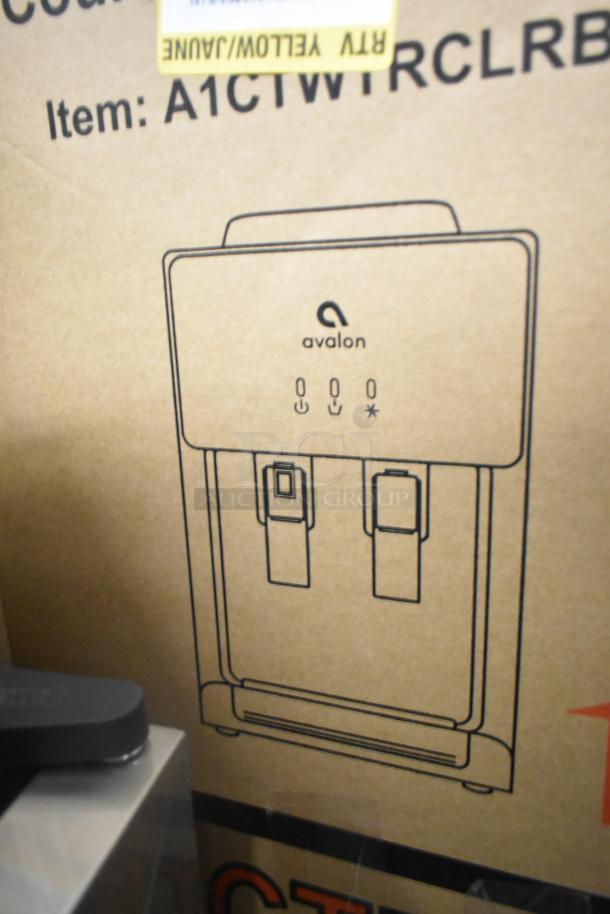 Avalon A1CTBLK countertop water cooler dispenser, hot/cold, brand new, scratch and dent, stock photo on box.