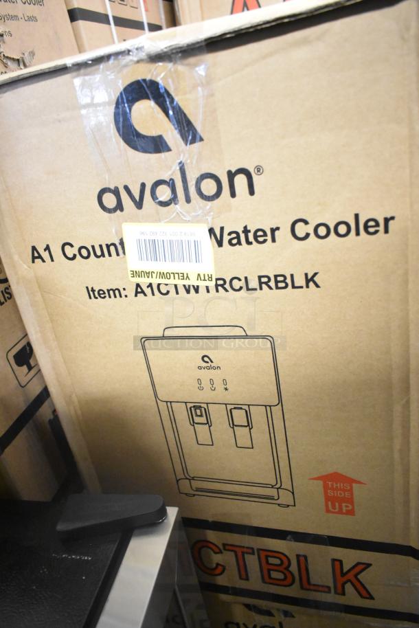 Boxed Avalon A1CTBLK Hot/Cold Water Cooler Dispenser. New condition, scratch and dent. Model: A1CTWRCLRBLK.