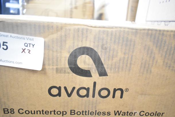 Avalon B8 Countertop Bottleless Water Cooler box with branding, indicating new condition despite minor scratches and dents.
