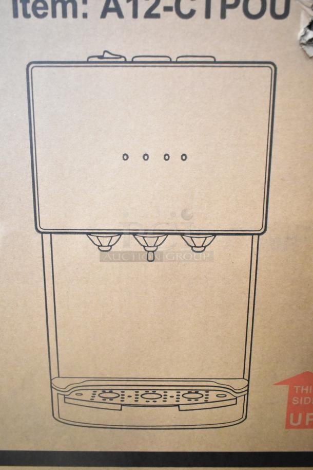 Illustration of Avalon A12-CTPOU bottleless water dispenser on cardboard packaging. Scratch and dent; new condition.