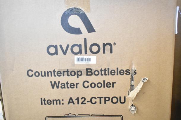Avalon A12-CTPOU Countertop Bottleless Water Dispenser box, new, with scratch and dent visible.