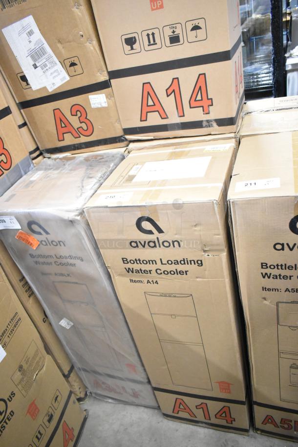 Boxes of Avalon A14 Bottom Loading Water Coolers, brand new with scratch and dent conditions, in stock packaging.